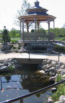 A gazebo and water feature help draw residents outside.