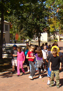 Children explore the new environs of Naper Settlement, where the sustainable landscape is a teaching tool.