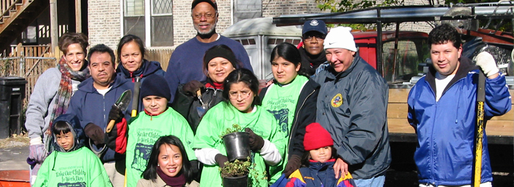 Volunteers installing an eco-friendly landscape at a Safe Home of St. Sabina, with pro bono help from WRD